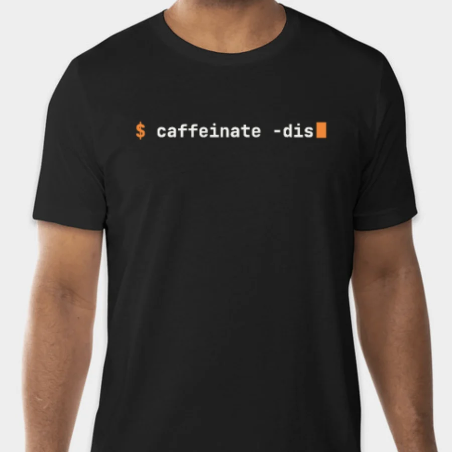Black t-shirt printed with a terminal prompt reading $ caffeinate -dis